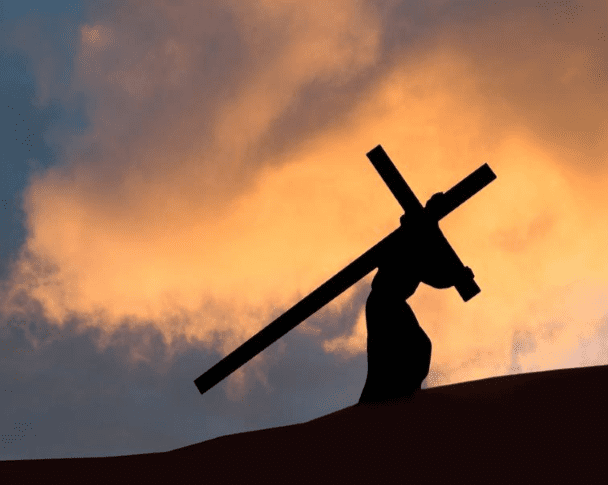 Jesus carrying cross silouette